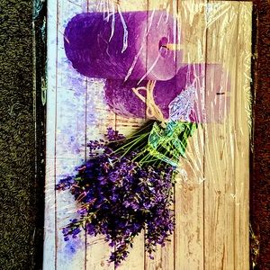 Beautiful canvas has lavender candles and lavender plants. Very rustic.